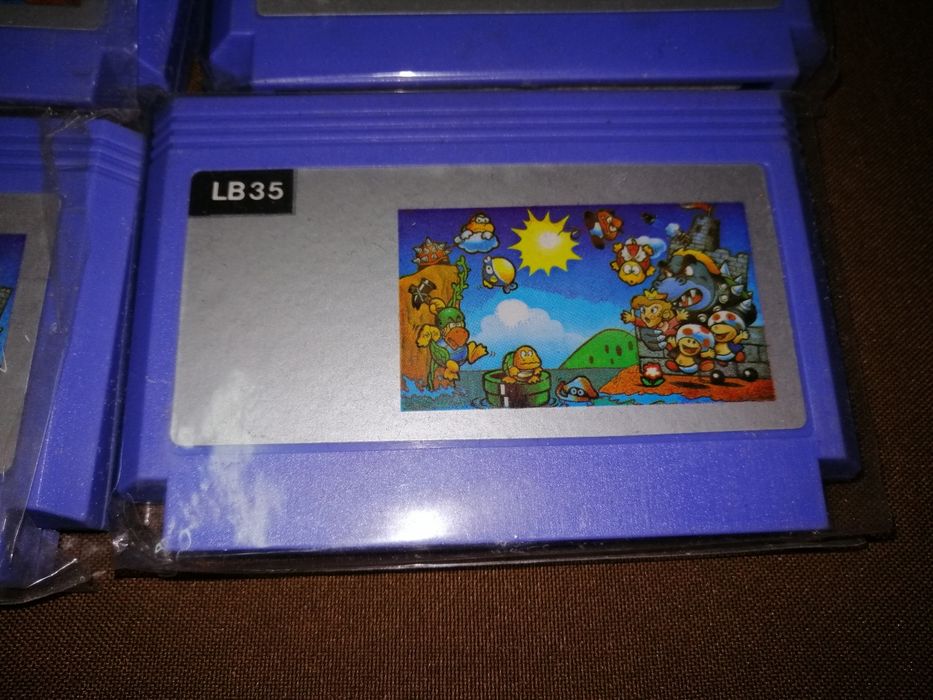 8 cartuxos super mario