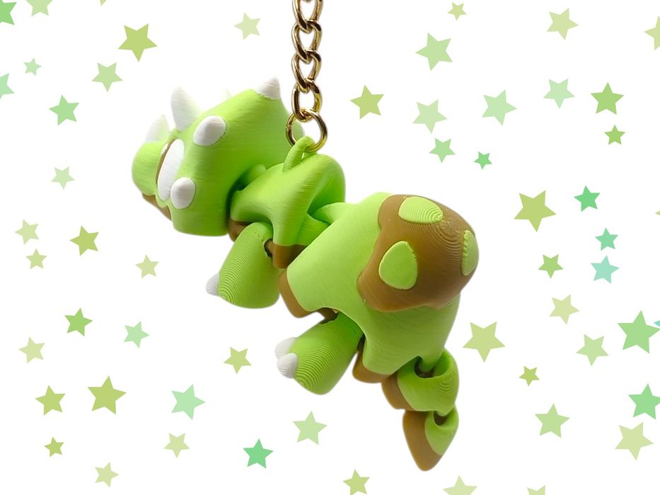 Brelok dinozaur triceratops zielony uroczy dodatek ruchomy breloczek