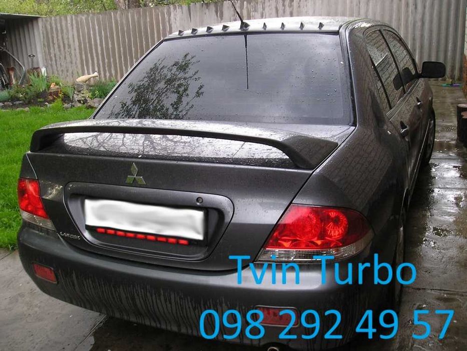 Накладки на пороги спойлер юбки реснички клыки Mitsubishi Lancer 9 10