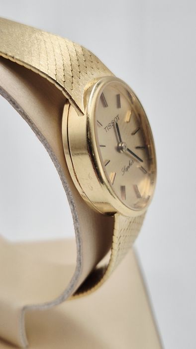 Złoty  Damski zegarek Tissot próba  750