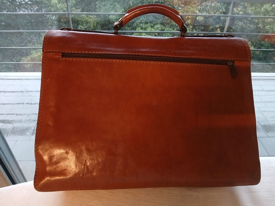 Pasta de executivo/professor, em couro.