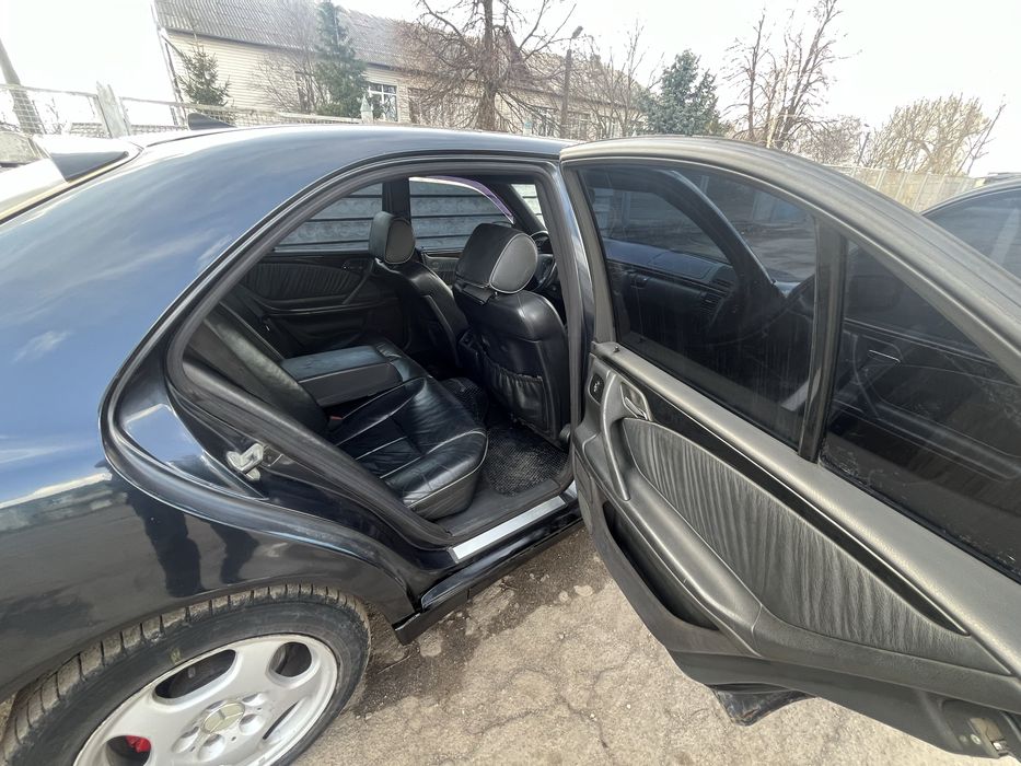 Мерседес Бенз 210