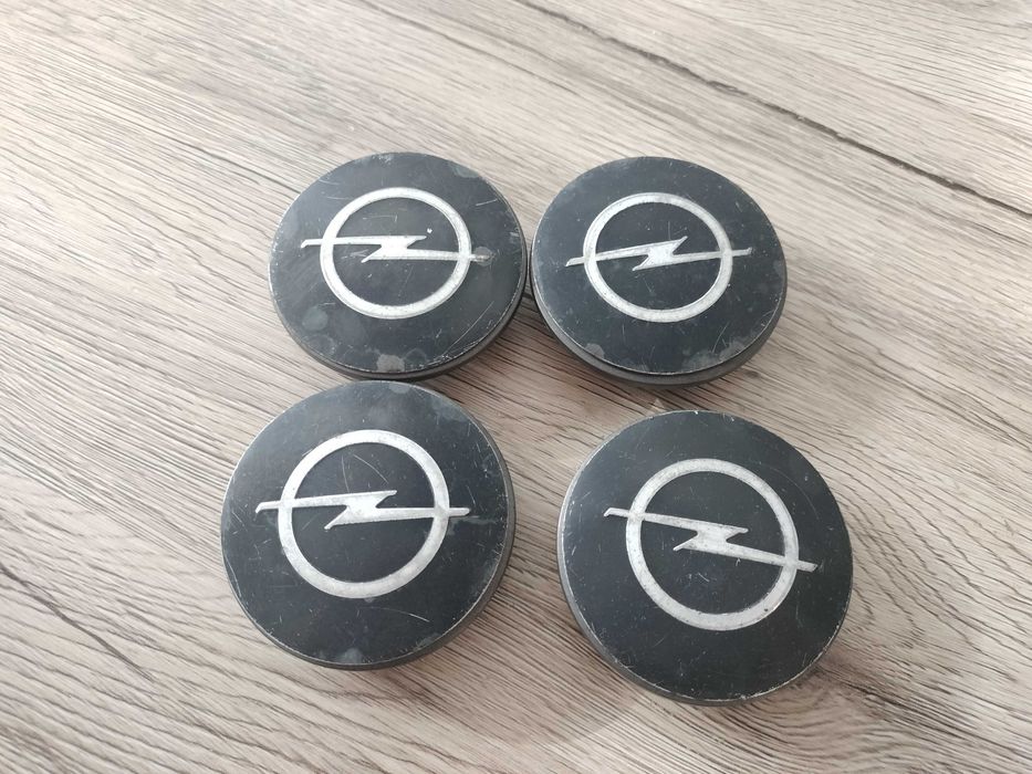 Dekielki dekle kapsle Opel GM komplet