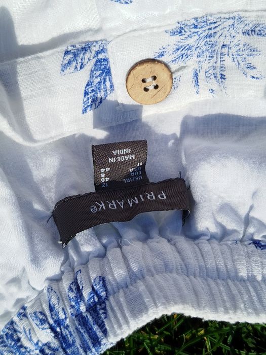 Biała spódnica na guziki z nieregularnym dołem Primark 40 L