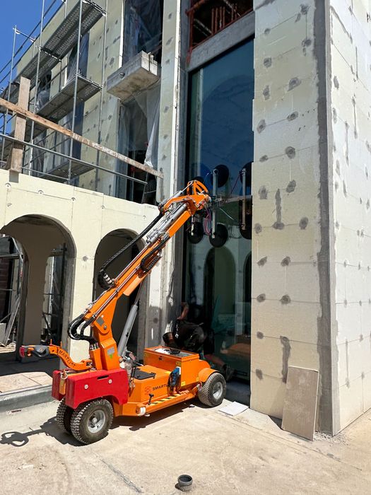 Serviço MiniGrua e Robôs de Vidro