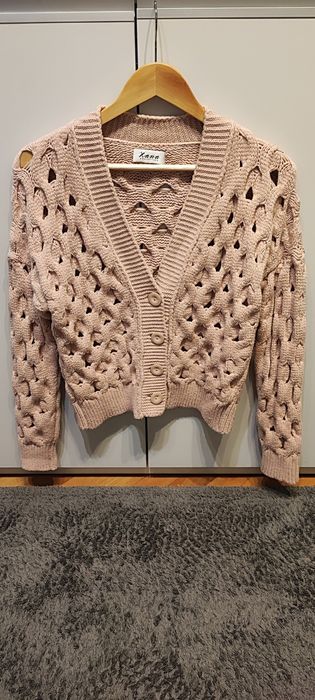 Nowy bez metki sweterek Xana