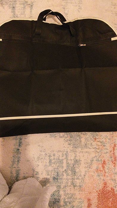 Capa-bolsa porta-fatos nova