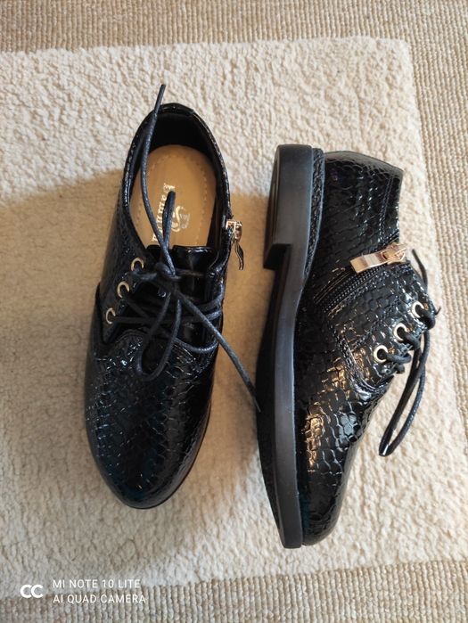 Туфельки на дівчинку