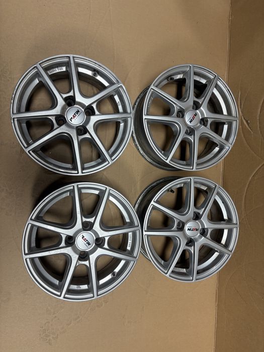 4x100 6JX15 56,6 OPEL CORSA ASTRA ADAM felgi aluminiowe CZUJNIKI TPMS