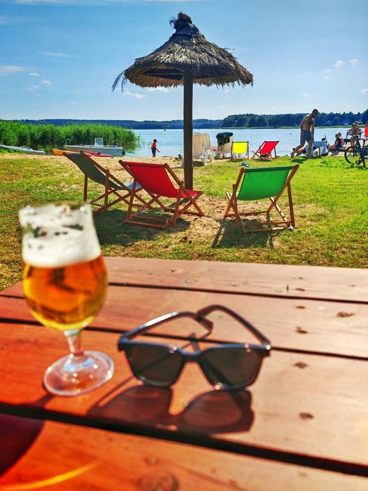 Domki CAŁOROCZNE nad jeziorem -BALIA z Jacuzzi, PLAŻA, Pomost, SAUNA