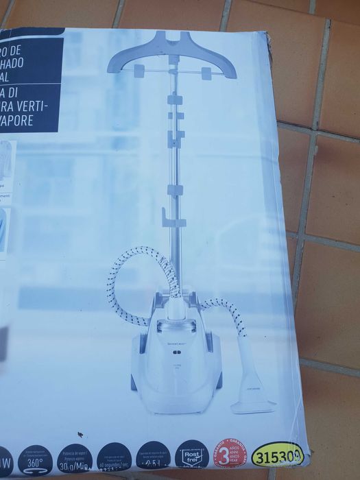 Maquina de engomar a vapor.64285416439297122