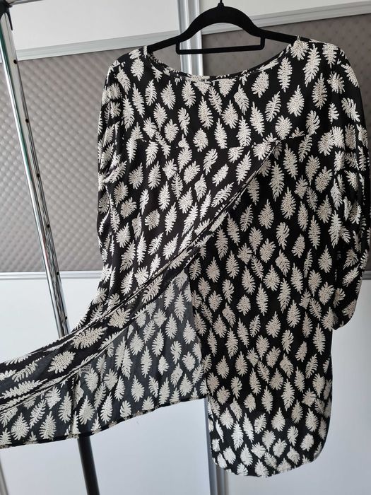 Długa elegancka bluzka z rozcięciem z tyłu r. 44