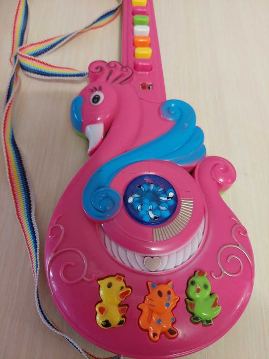 Игрушка гитара со звуковыми эфектами