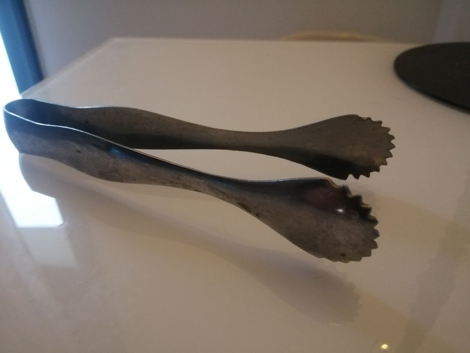 Pinça antiga em bom estado