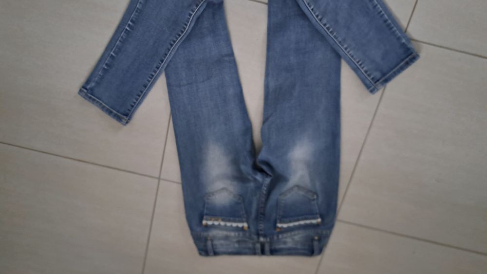 Spodnie dżinsy wycierane 36 s