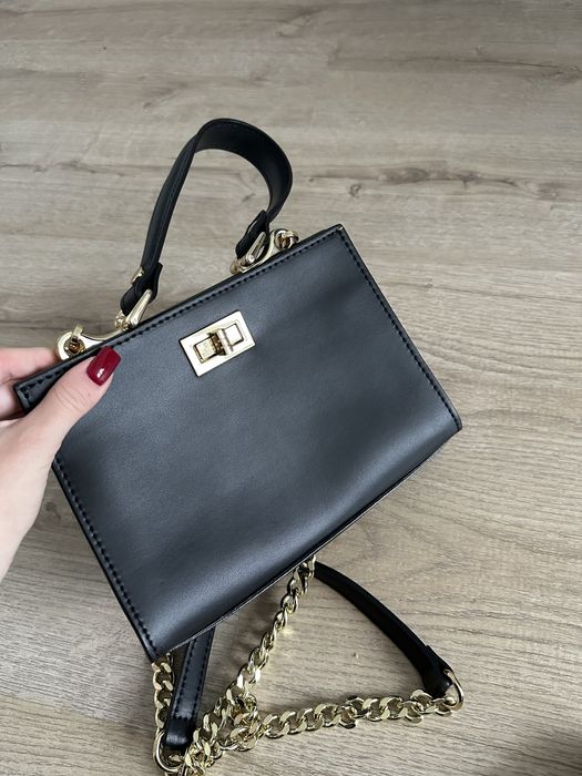 Skórzana mini torebka z rączką Ryłko