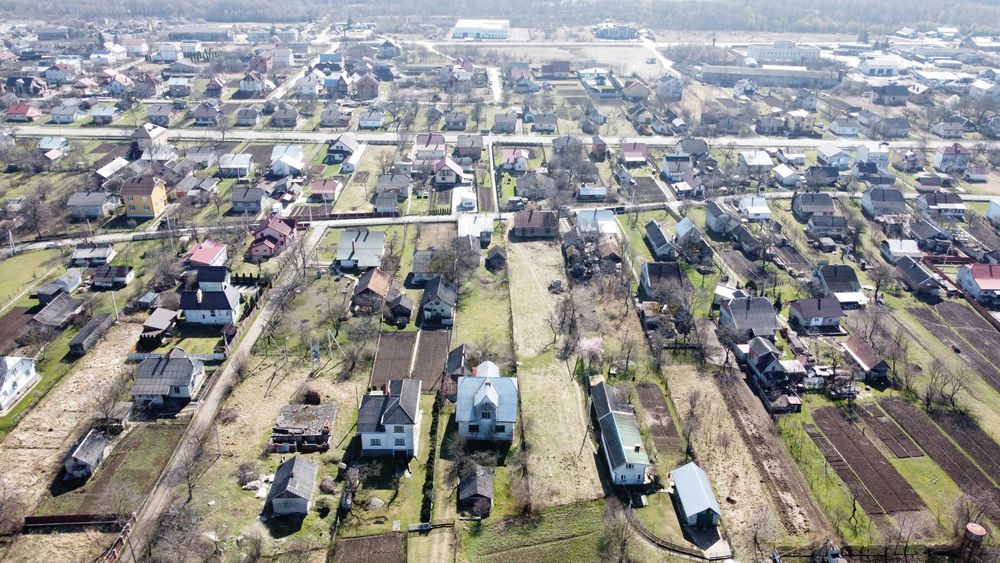 Ділянки 24 сот.землі та будинку  по вул. Шашкевича 150 у с. Дуліби