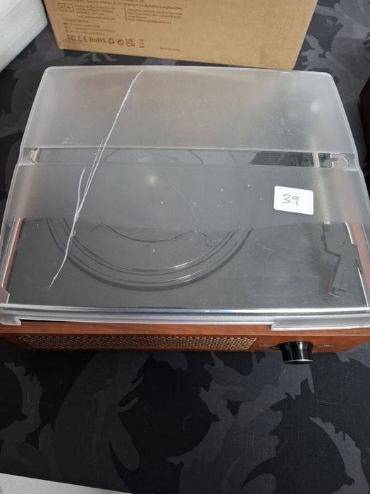 Gira discos com tampa danificada