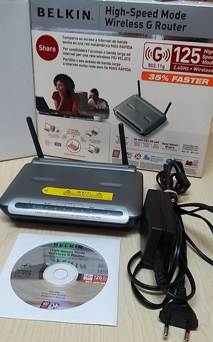 Router Belkin, com manual de instruções.