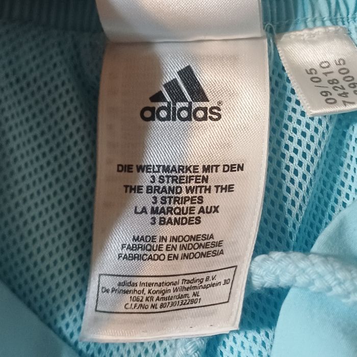 Piękne błękitne spodnie adidas 40