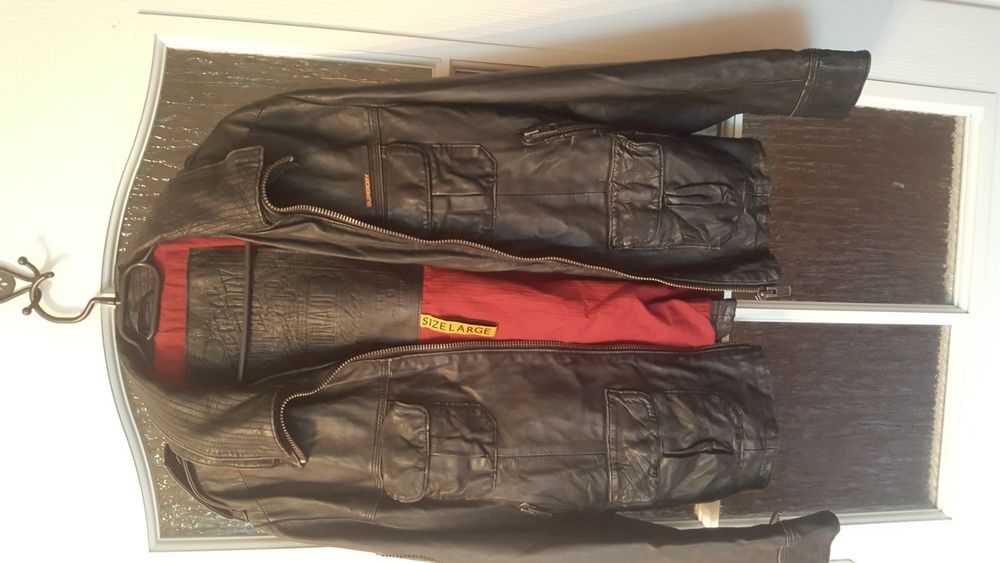 Redukcja ceny . Skora meska Superdry