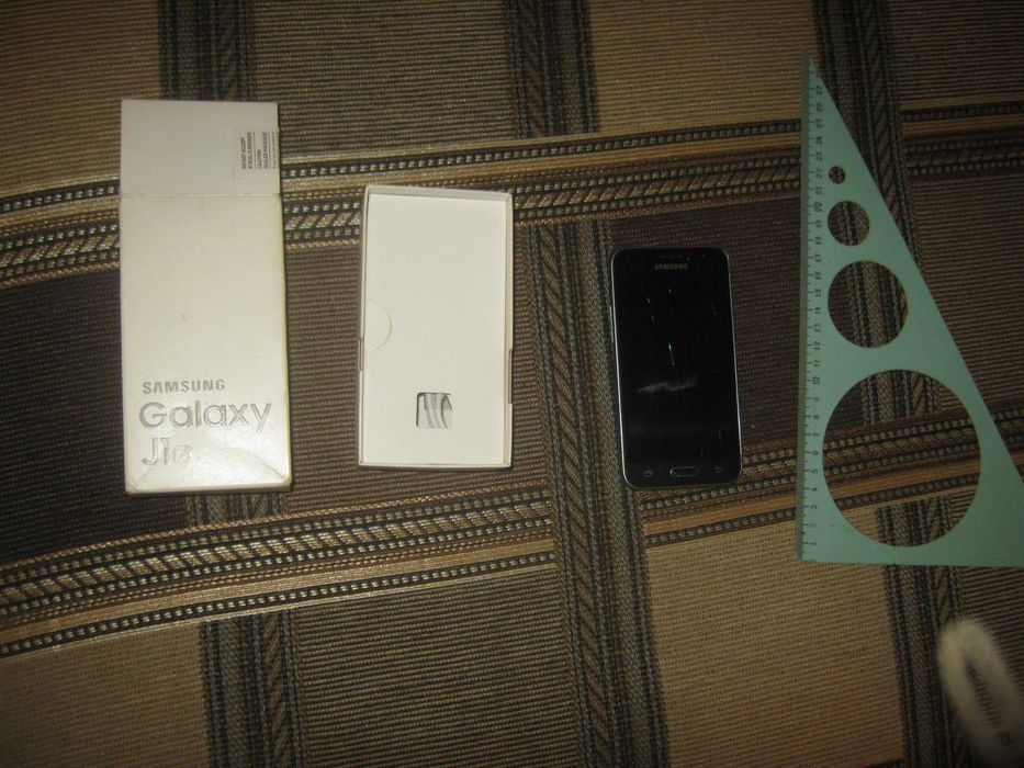Samsung Galaxy J1,под ремонт.С коробкой и шнуром.