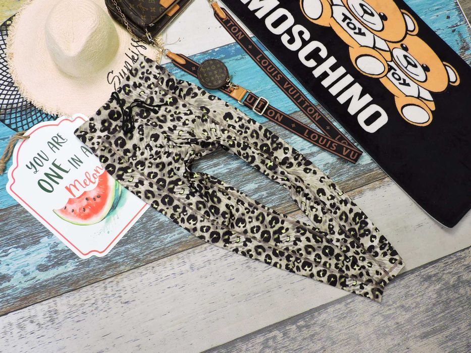 Crivit Nowe legginsy push up cętki S