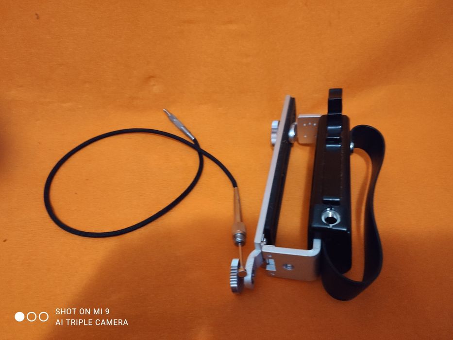 Suporte  manual para máquina fotográfica