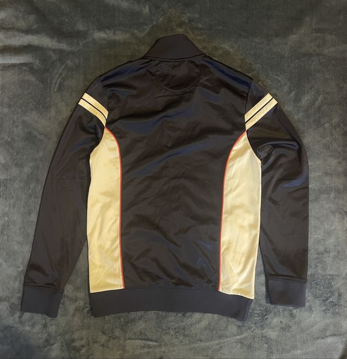 Олімпійка Sergio Tacchini