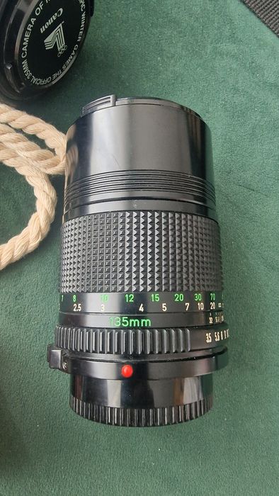 Canon AE-1 + Lente 50mm f/1.8 + Lente 135mm + Flash + Bolsa
