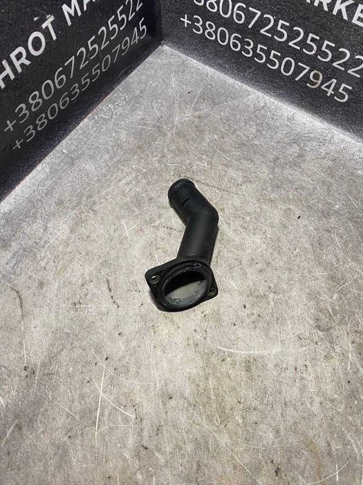 Кришка термостата фланець 1.6 MPI VW Skoda Audi Seat 06A121121C