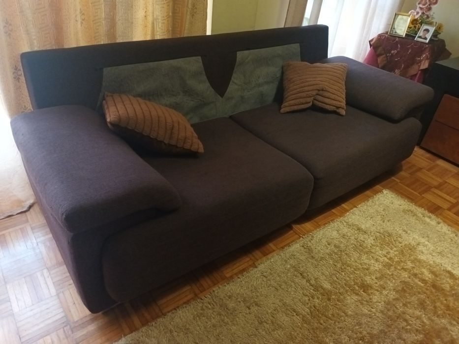 Sofá cama de três lugares