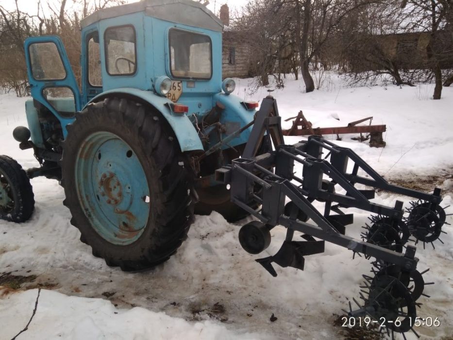 Окучник, культиватор,підгортач.