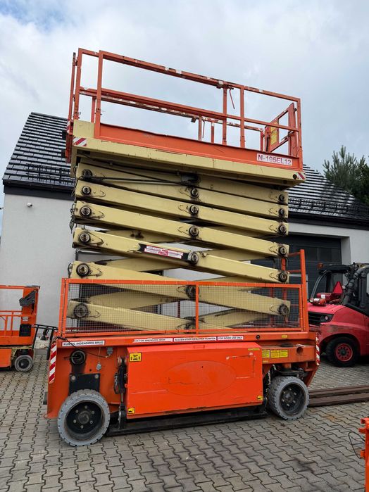 Podnośnik nożycowy elektryczny Holland Lift N 195 EL12 JLG GENIE