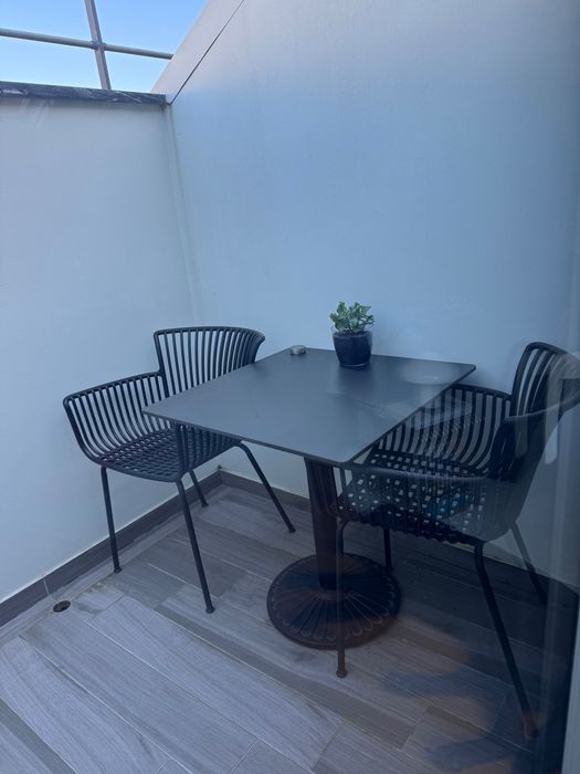 Mesa e cadeiras de exterior