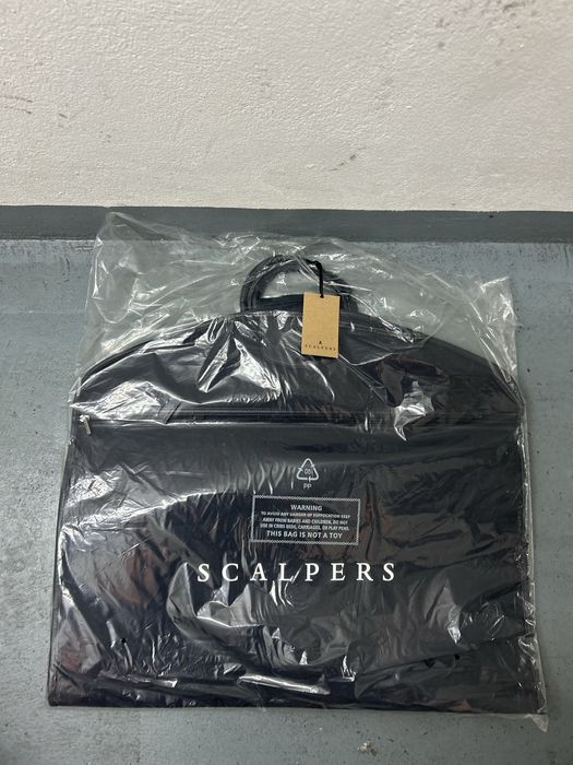 Porta fatos Scalpers