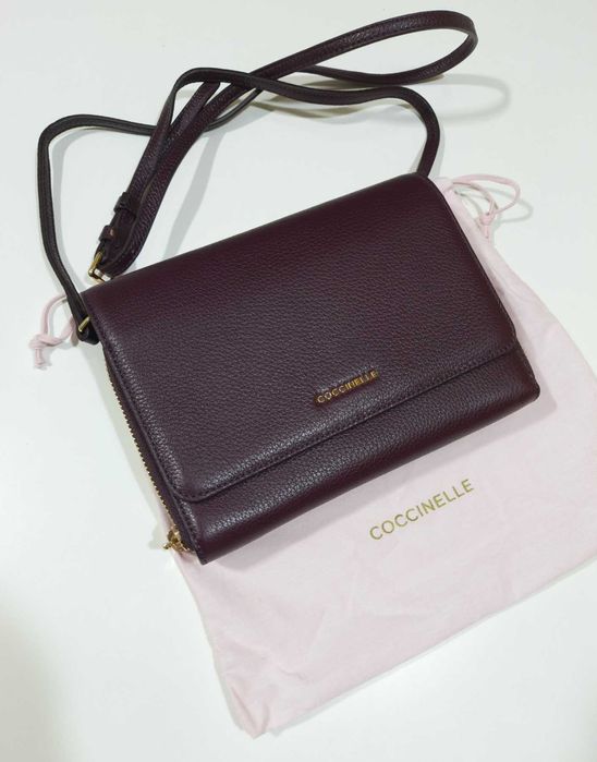 Кожаная сумка клатч Coccinelle