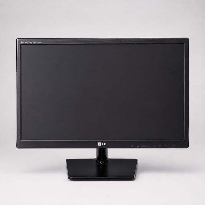 Монітор LG Flatron E2342C-BN у робочому стані, чорного кольору.