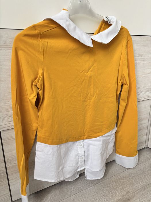Блуза жіноча жовтого кольору .
