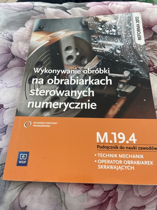 Wykonywanie obróbki na obrabiarkach sterowanych numerycznie /Janusz Figurski