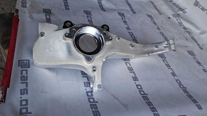 Tesla Model 3 — Цапфа (поворотный кулак) передний правый