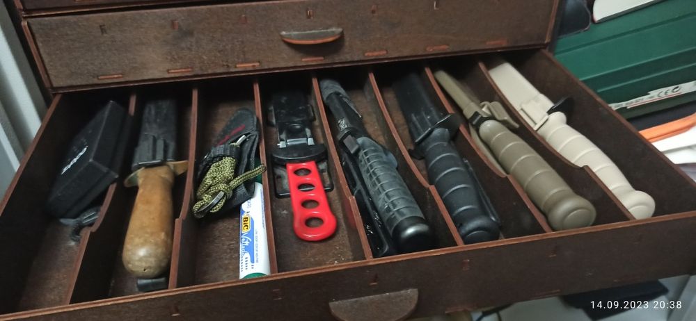 Комод для колекціонування ножів victorinix mora glock buck ontario