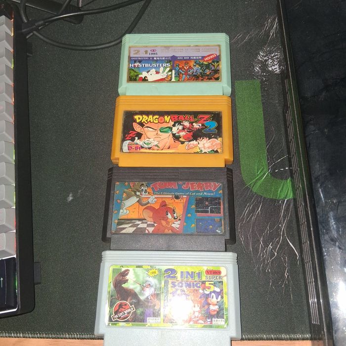 Consola com 2 cumandos e cabo de alimz e jogosntacão