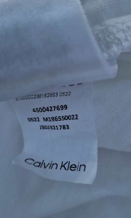 T- shirt bialy:Calvin Klein".