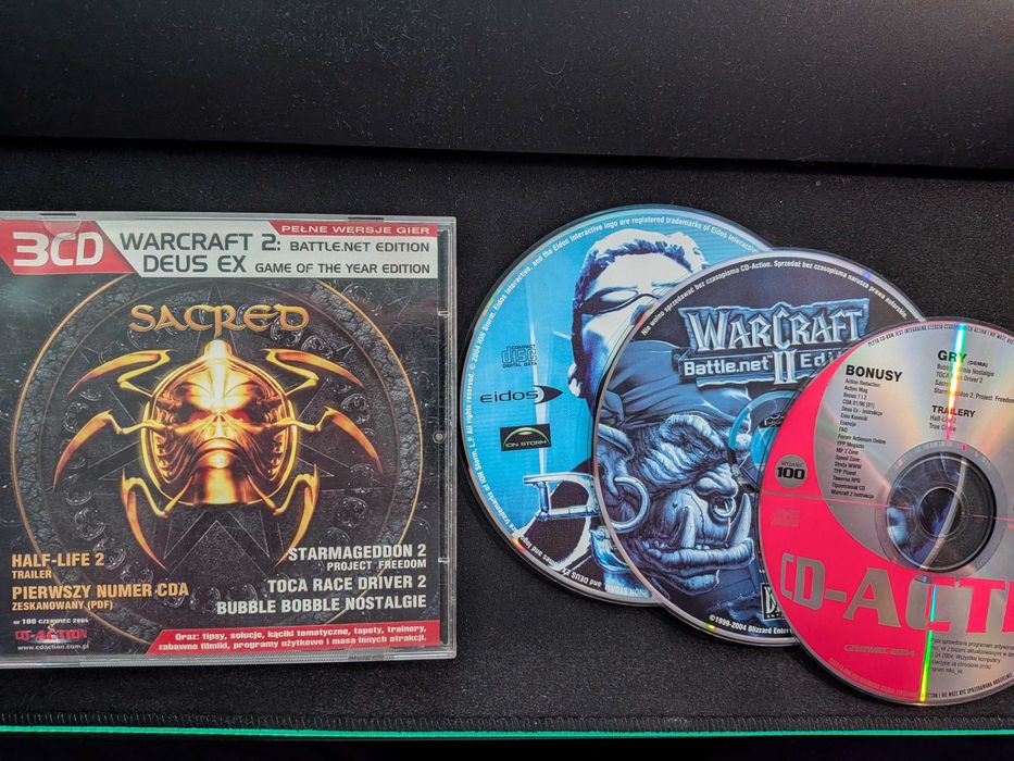 WarCraft 2 Battle.net Edition + Deus EX Game of the Year Edition PC