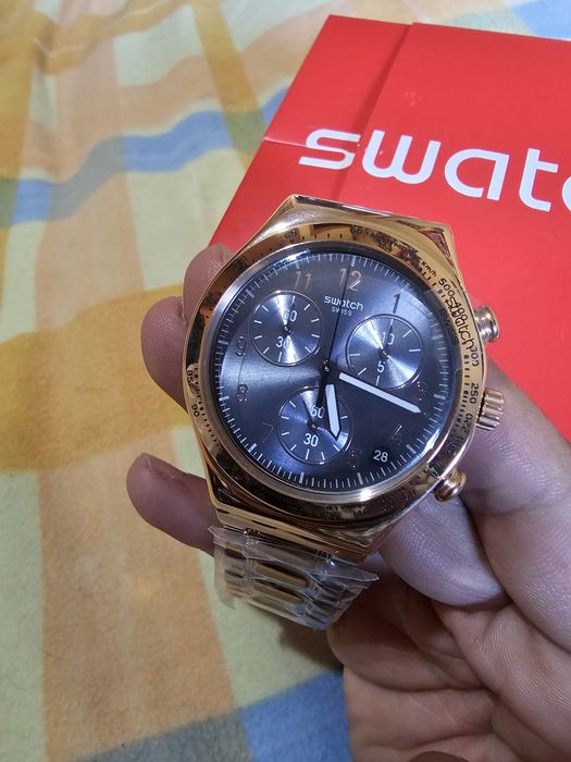 Swatch Irony Chrono dourado. Novo.