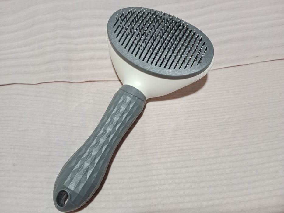 Щітка для вичісування котів, пуходерка