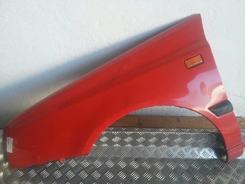 GUARDA-LAMAS FRONTAL ESQUERDO VOLKSWAGEN GOLF III 1950 -ROJO