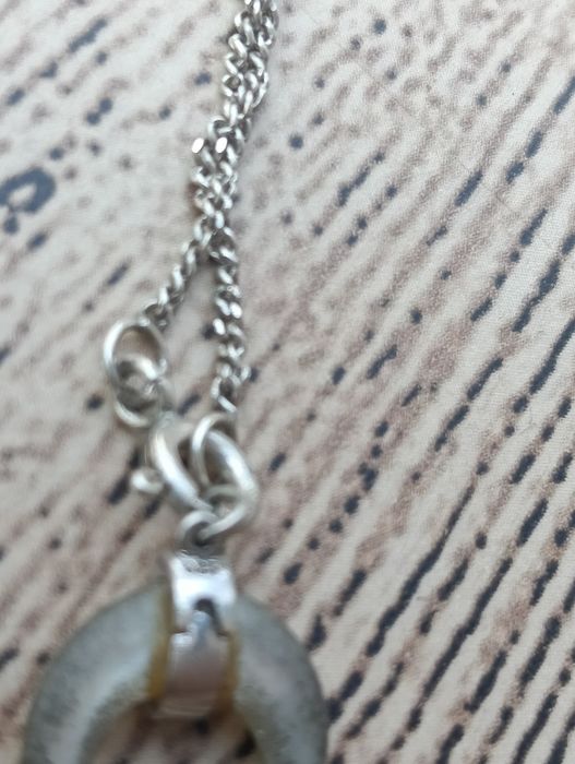 Fio de prata com pendente,tal como se encontra