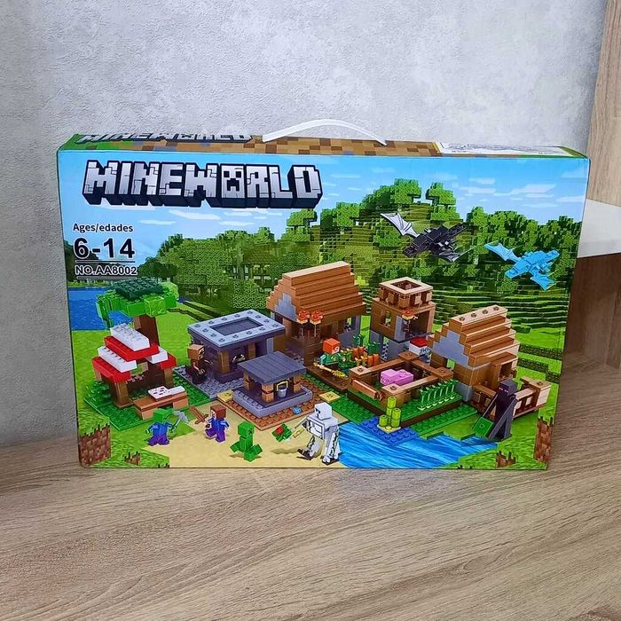 Лего Майнкрафт Деревня жителей с Драконами, 938 деталей Lego MINECRAFT